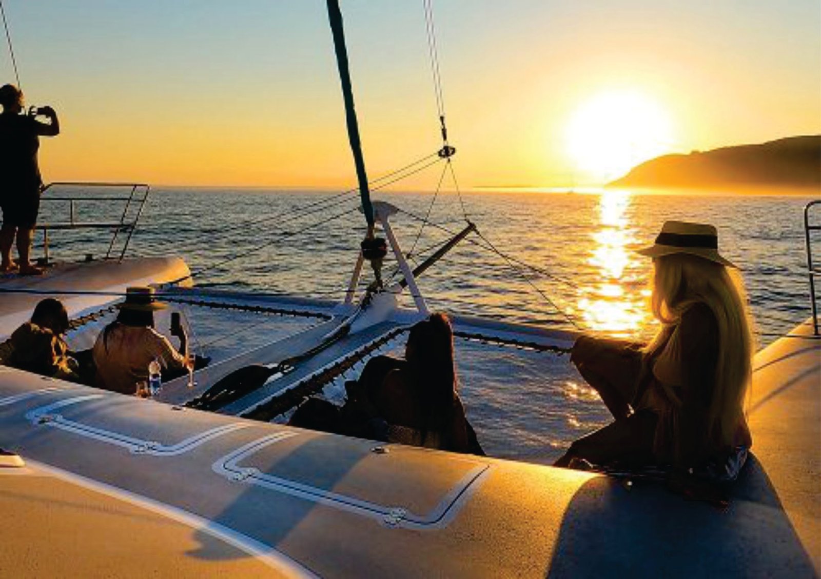 Sailing on the Tagus River at the sunset is a unique experience. The city changes color