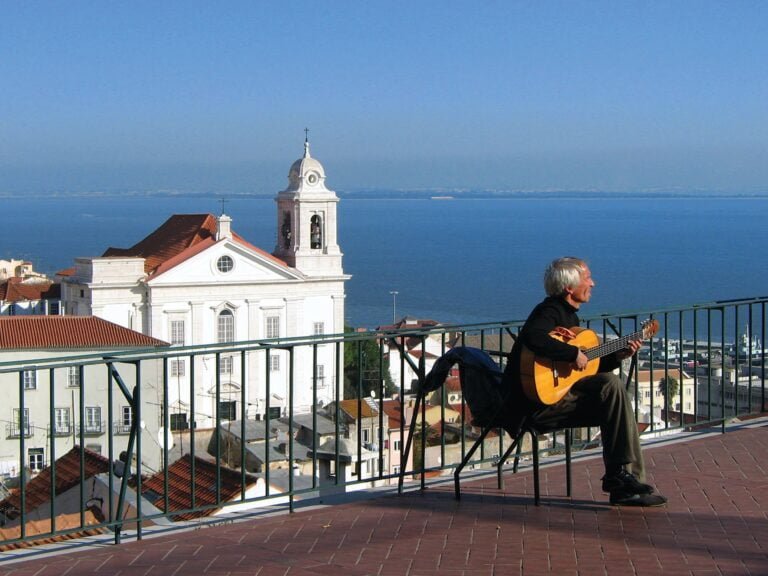 Explore the imposing São Jorge Castle. As you climb the hills