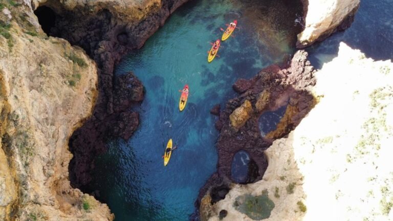 Explore Ponta da Piedade and its hidden spots only accessible by kayak