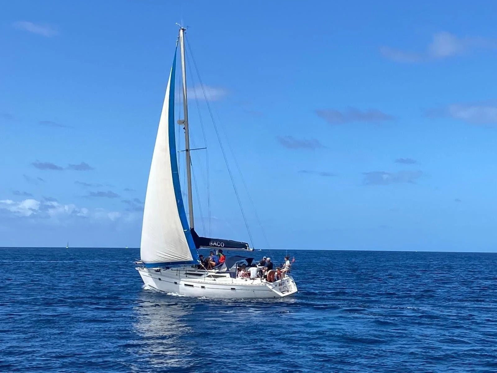 Sailing yacht under sail on deep blue water