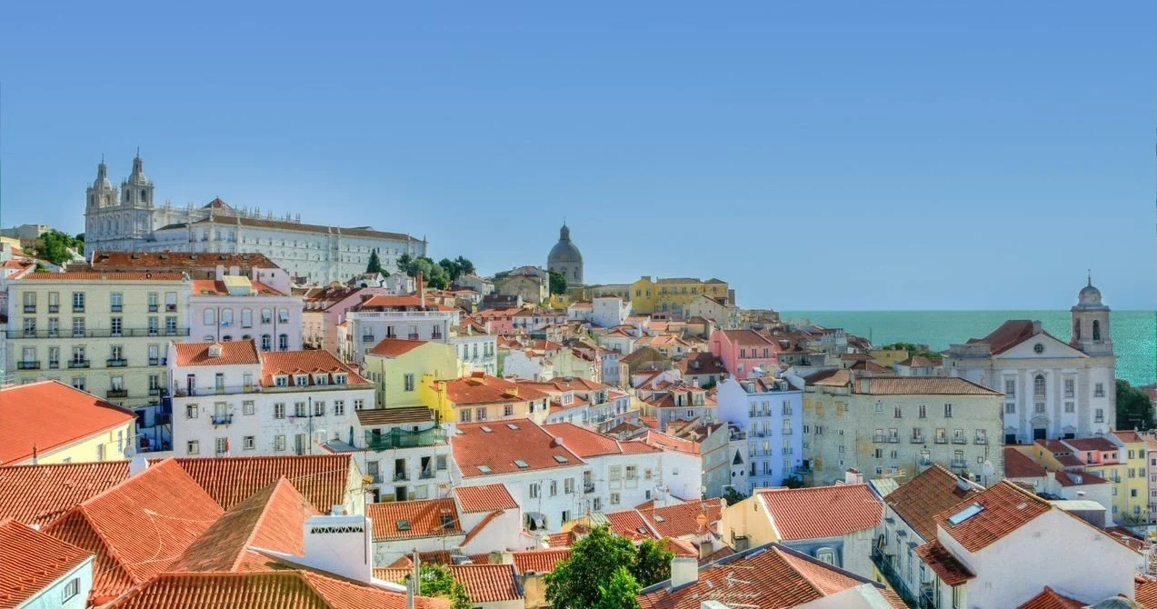 View over Alfama's rooftops towards the river