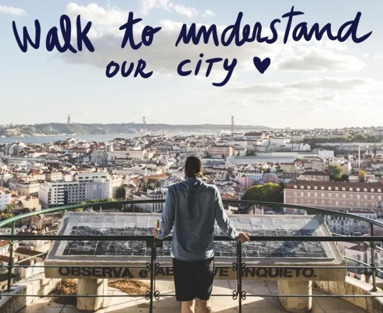 Hand-lettered 'Walk to understand our city' above a view of Lisbon, with a person at a viewpoint