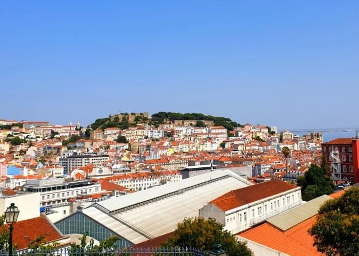 Lisbon rooftops with the castle on the hill
