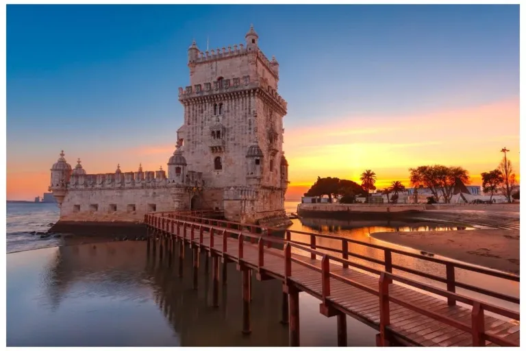 Belém Tower at sunset with its wooden walkway