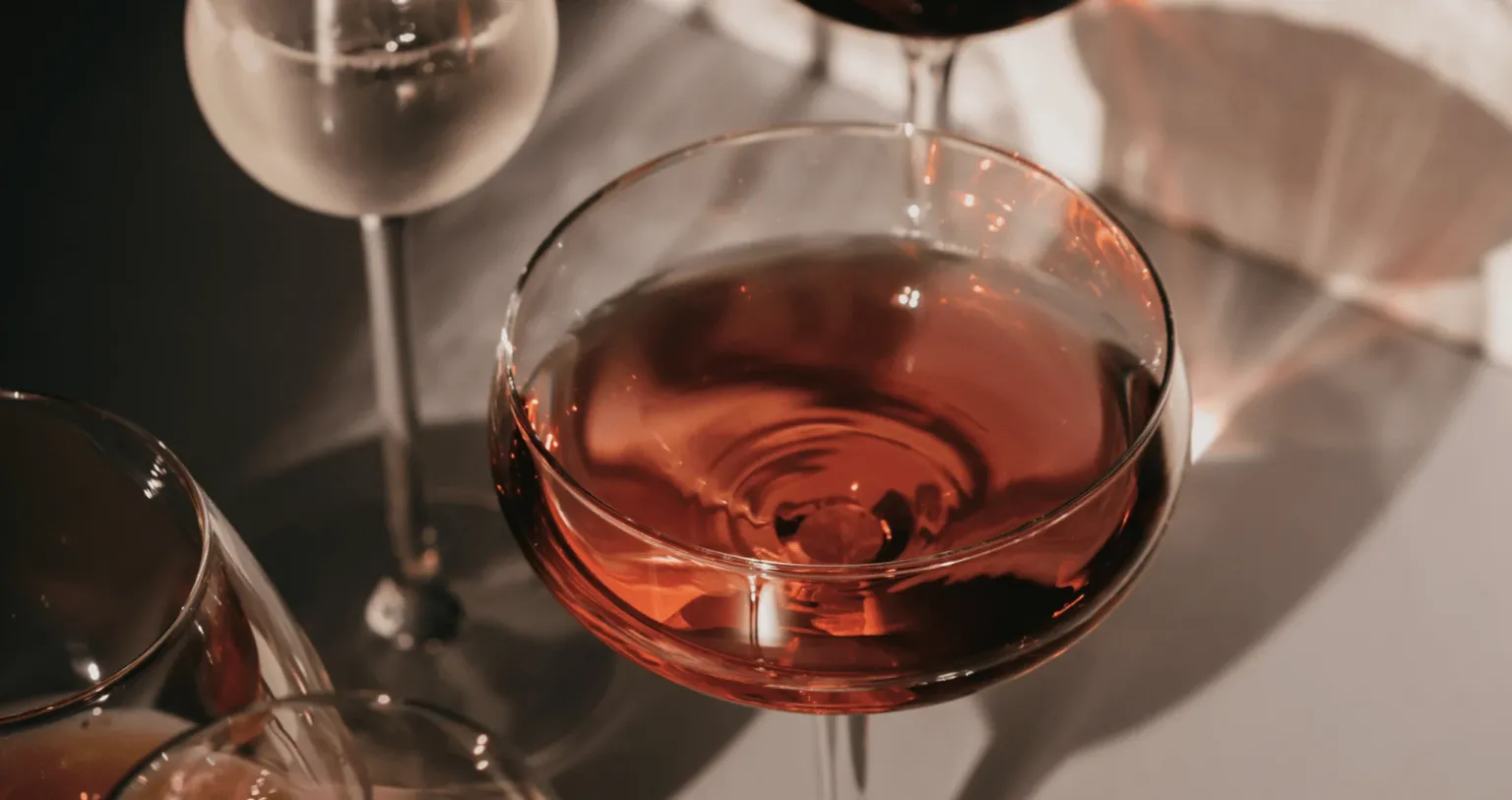 Glass of rosé wine on a table