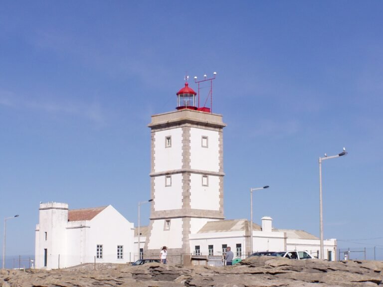 The lighthouse and limestone cliffs of Cabo Carvoeiro at Peniche